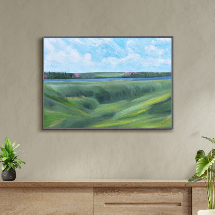 Acrylic painting on canvas, depicting a calm green meadow stretching toward a river. On the other side, a forested area hides distant pink-roofed houses beneath a bright sky filled with soft clouds.