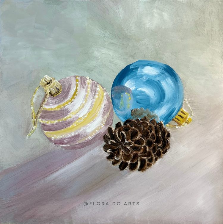 A small 20x20 cm painting depicting Christmas decorations: a pink striped bauble, a shiny blue ornament, and a textured pinecone, arranged against a soft, neutral background. The artwork radiates a warm and festive holiday vibe.